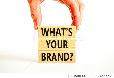 Branding and what is your brand symbol. Concept words What is your brand on beautiful blocks. Beautiful white background. Businessman hand. Business branding what is your brand concept. Copy space. Branding and what is your brand symbol. Concept words What is your brand on beautiful blocks. Beautiful white background. Businessman hand. Business branding what is your brand concept. Copy space. 117688369