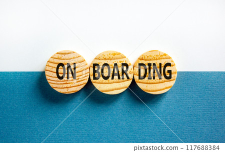 Onboarding success symbol. Concept word Onboarding on wooden circles. Beautiful blue white background. Business onboarding success concept. Copy space. 117688384