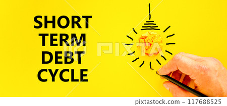 Short term debt cycle symbol. Concept words Short term debt cycle on beautiful yellow paper. Beautiful yellow background. Businessman hand. Business Short term debt cycle concept. Copy space 117688525