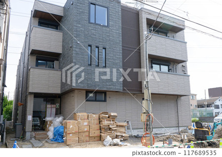 Low-rise apartment building under construction (front entrance) Low-rise apartment building under construction (front entrance) 117689535