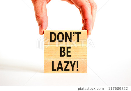 Motivational and do not be lazy symbol. Concept words Do not be lazy on wooden blocks on a beautiful white table white background. Businessman hand. Business do not be lazy concept. Copy space. 117689822