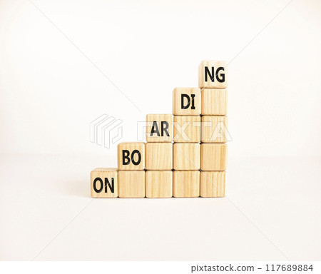 Onboarding success symbol. Concept word Onboarding on wooden blocks. Beautiful white background. Business onboarding success concept. Copy space. 117689884