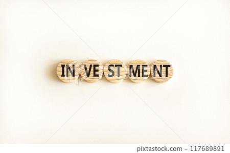 Investment symbol. Concept word Investment on beautiful wooden circles. Beautiful white background. Business investment concept. Copy space. Investment symbol. Concept word Investment on beautiful wooden circles. Beautiful white background. Business investment concept. Copy space. 117689891