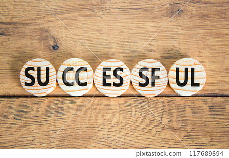 Successful symbol. Concept word Successful on beautiful wooden circles. Beautiful wooden background. Business successful concept. Copy space. Successful symbol. Concept word Successful on beautiful wooden circles. Beautiful wooden background. Business successful concept. Copy space. 117689894