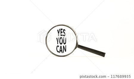 Motivational Yes you can symbol. Concept words Yes you can in beautiful magnifying glass. Beautiful white table white background. Business motivational and Yes you can concept. Copy space Motivational Yes you can symbol. Concept words Yes you can in beautiful magnifying glass. Beautiful white table white background. Business motivational and Yes you can concept. Copy space 117689935