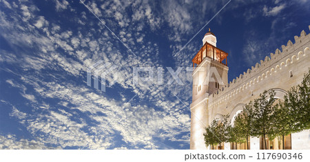King Hussein Bin Talal mosque in Amman (at night), Jordan.  Against the background of a beautiful sky with clouds 117690346