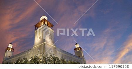 King Hussein Bin Talal mosque in Amman (at night), Jordan.  Against the background of a beautiful sky with clouds 117690368