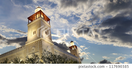King Hussein Bin Talal mosque in Amman (at night), Jordan.  Against the background of a beautiful sky with clouds 117690385