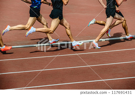 group athletes running 800 meters at stadium 117691431