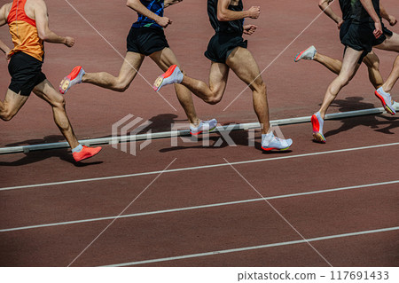 athletics competition group athletes running 800 meters at stadium athletics competition group athletes running 800 meters at stadium 117691433