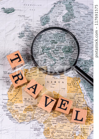 Conceptual background for travel with passport, magnifying glass, world map and money Conceptual background for travel with passport, magnifying glass, world map and money 117691575