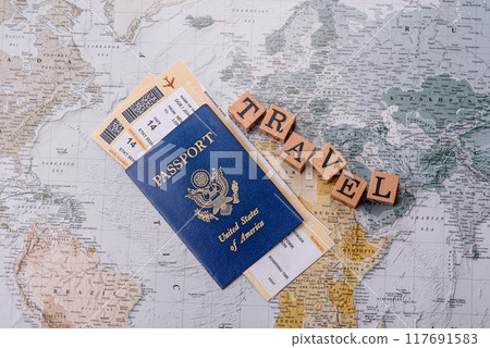 Conceptual background for travel with passport, magnifying glass, world map and money 117691583