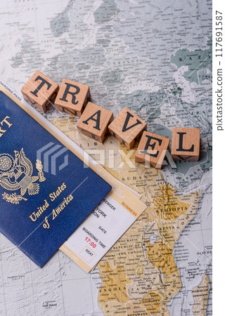 Conceptual background for travel with passport, magnifying glass, world map and money 117691587