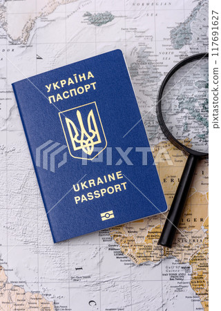 Conceptual background for travel with passport, magnifying glass, world map and money Conceptual background for travel with passport, magnifying glass, world map and money 117691627