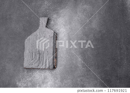 Empty wooden cutting board. Kitchen utensils Empty wooden cutting board. Kitchen utensils 117691921