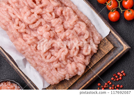 Fresh raw chicken mince with salt and spices Fresh raw chicken mince with salt and spices 117692087