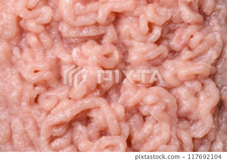 Fresh raw chicken mince with salt and spices 117692104
