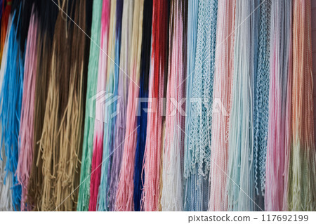 Zizi's colored pigtails from kanekalon. Artificial hair for braiding Afro-pigtails and hairstyles. Bright colors. Textured wallpaper. With space to copy. High quality photo Zizi's colored pigtails from kanekalon. Artificial hair for braiding Afro-pigtails and hairstyles. Bright colors. Textured wallpaper. With space to copy. High quality photo 117692199