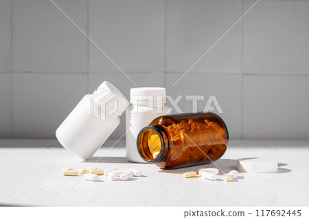 White pill bottles. Health care food supplements, vitamins and medicaments White pill bottles. Health care food supplements, vitamins and medicaments 117692445