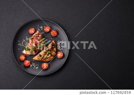 Variation of several toasts or bruschetta with prosciutto, mushrooms and veal Variation of several toasts or bruschetta with prosciutto, mushrooms and veal 117692859
