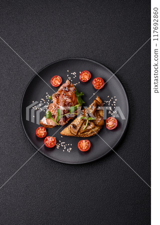 Variation of several toasts or bruschetta with prosciutto, mushrooms and veal Variation of several toasts or bruschetta with prosciutto, mushrooms and veal 117692860