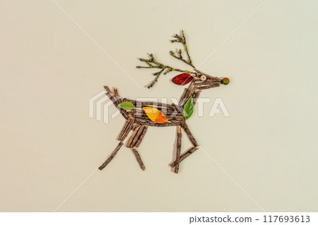 Creative reindeer figure from natural materials 117693613