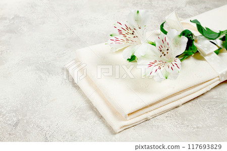 kitchen towels, cream color, with alstroemeria, Peruvian lily, top view, concept, decor, no people, kitchen towels, cream color, with alstroemeria, Peruvian lily, top view, concept, decor, no people, 117693829