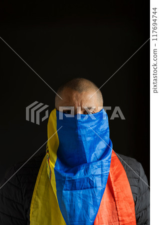 Hooded fighting for freedom, resistance for democracy in Venezuela, violation of human rights 117694744