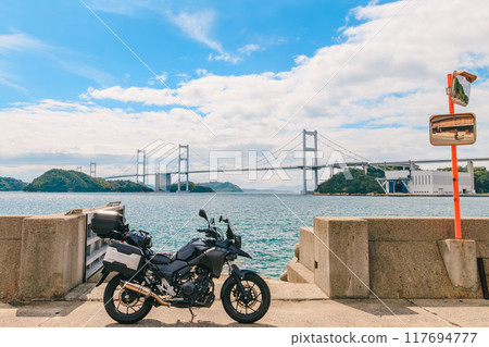 Shimanami Kaido's Kurushima Kaikyo First Bridge and motorcycle 117694777