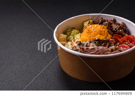Bowl of food with beef, bulgur, tomatoes, mushrooms, zucchini 117694809