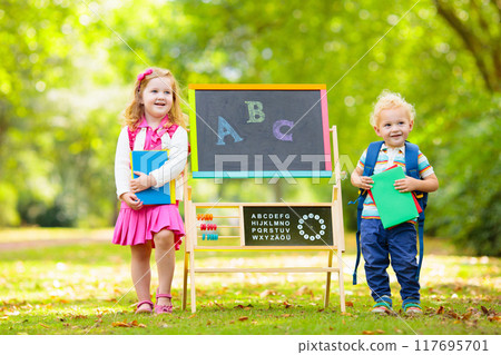 Children happy to be back to school Children happy to be back to school 117695701