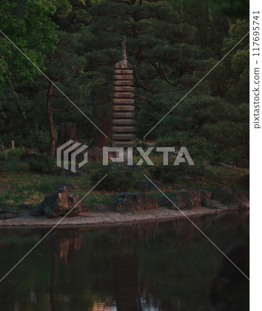 Stone Totem by Tranquil Pond 117695741