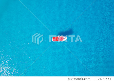 Aerial View of a Boat in the Caribbean Sea Aerial View of a Boat in the Caribbean Sea 117699335