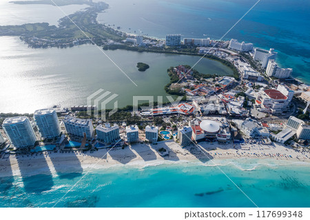 Turquoise Waves at Sunset 117699348