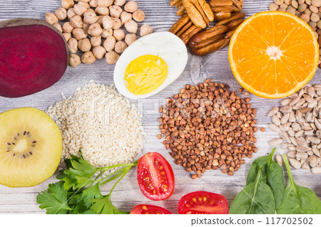 Various products or ingredients containing natural vitamin B9 and minerals 117702502