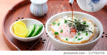 A simple fried egg bowl (rice topped with a fried egg) is fine. 117702559