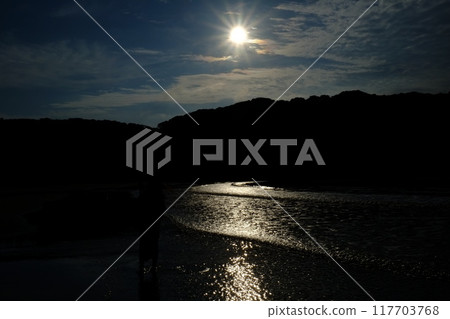 Sunrise, backlit beach Sunrise, backlit beach 117703768