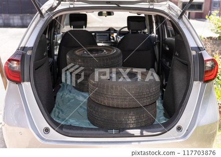 Passenger car with studless tires 117703876