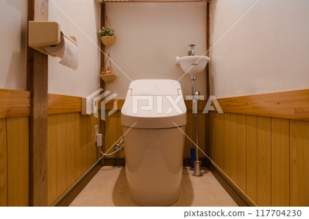 A restroom with a calm atmosphere and warm lighting 117704230