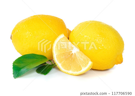 Lemon with leaves close up on white background. Lemon with leaves close up on white background. 117706590