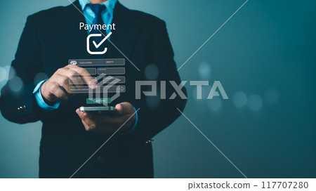 Businessman press finger on smartphone to pay with online apps, Digital banking network, Internet payment, Financial technology, Online shopping and payment via mobile banking apps. 117707280