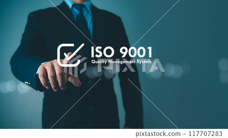 ISO 9001 Standard certification standardisation quality control concept. Businessman point your finger at text ISO 9001 for quality management of organizations, Certified and quality. 117707283
