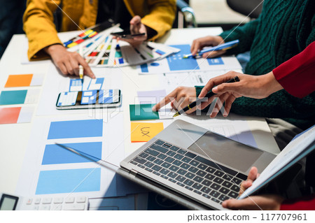 UX developer and ui designer brainstorming about mobile app interface wireframe design with customer breif and color code, User experience concept 117707961