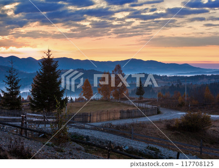 Early morning misty autumn Carpathian mountain village, Ukraine. Early morning misty autumn Carpathian mountain village, Ukraine. 117708125
