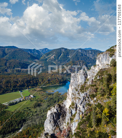View from up to autumn Alps mountain lake with clear transparent water and reflections. Almsee lake, Upper Austria. 117708168