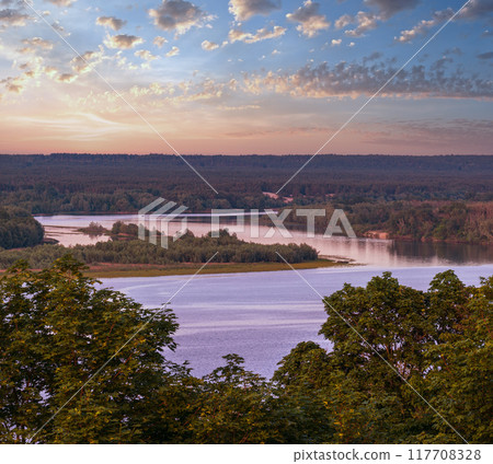 Dnipro river summer evening view from Taras Hill or Chernecha Hora (Monk Hill - important landmark of the Taras Shevchenko National Preserve, Kaniv, Cherkasy Region, Ukraine. Dnipro river summer evening view from Taras Hill or Chernecha Hora (Monk Hill - important landmark of the Taras Shevchenko National Preserve, Kaniv, Cherkasy Region, Ukraine. 117708328