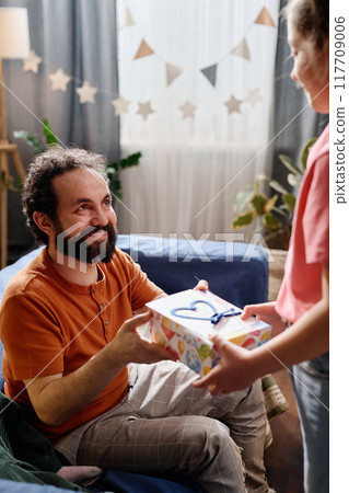 Celebrating Birthday with Joyful Smiles and Gift Giving Celebrating Birthday with Joyful Smiles and Gift Giving 117709006