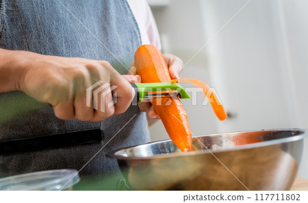 Chef at the kitchen preparing massaman curry with sweet potato and many spices 117711802