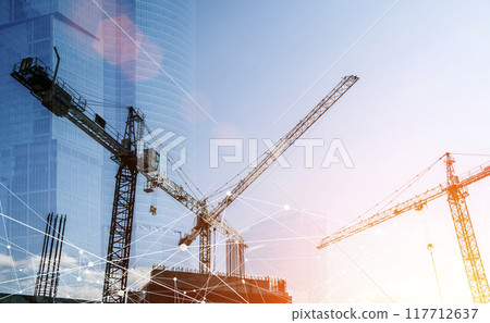 Construction technology banner background. Construction site with cranes, fittings and concrete. Construction technology banner background. Construction site with cranes, fittings and concrete. 117712637