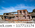 The ruins of Gunkanjima against the blue sky 117713174